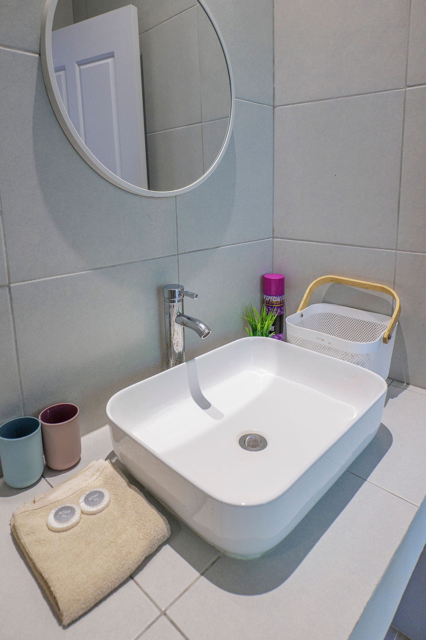 Bathroom with a vessel sink, mirror and new fittings