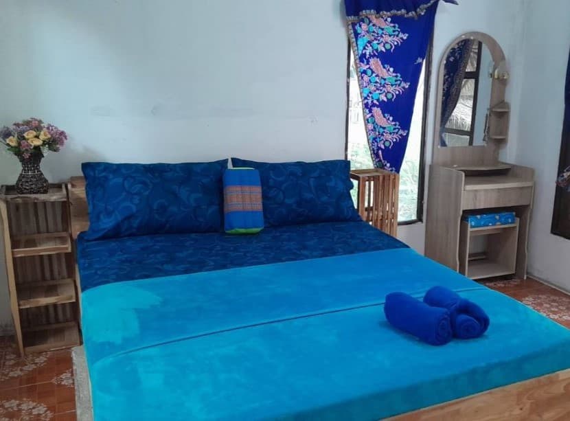 A simple Thai-style room at Bamboo Hut, the neighbouring resort across the lane