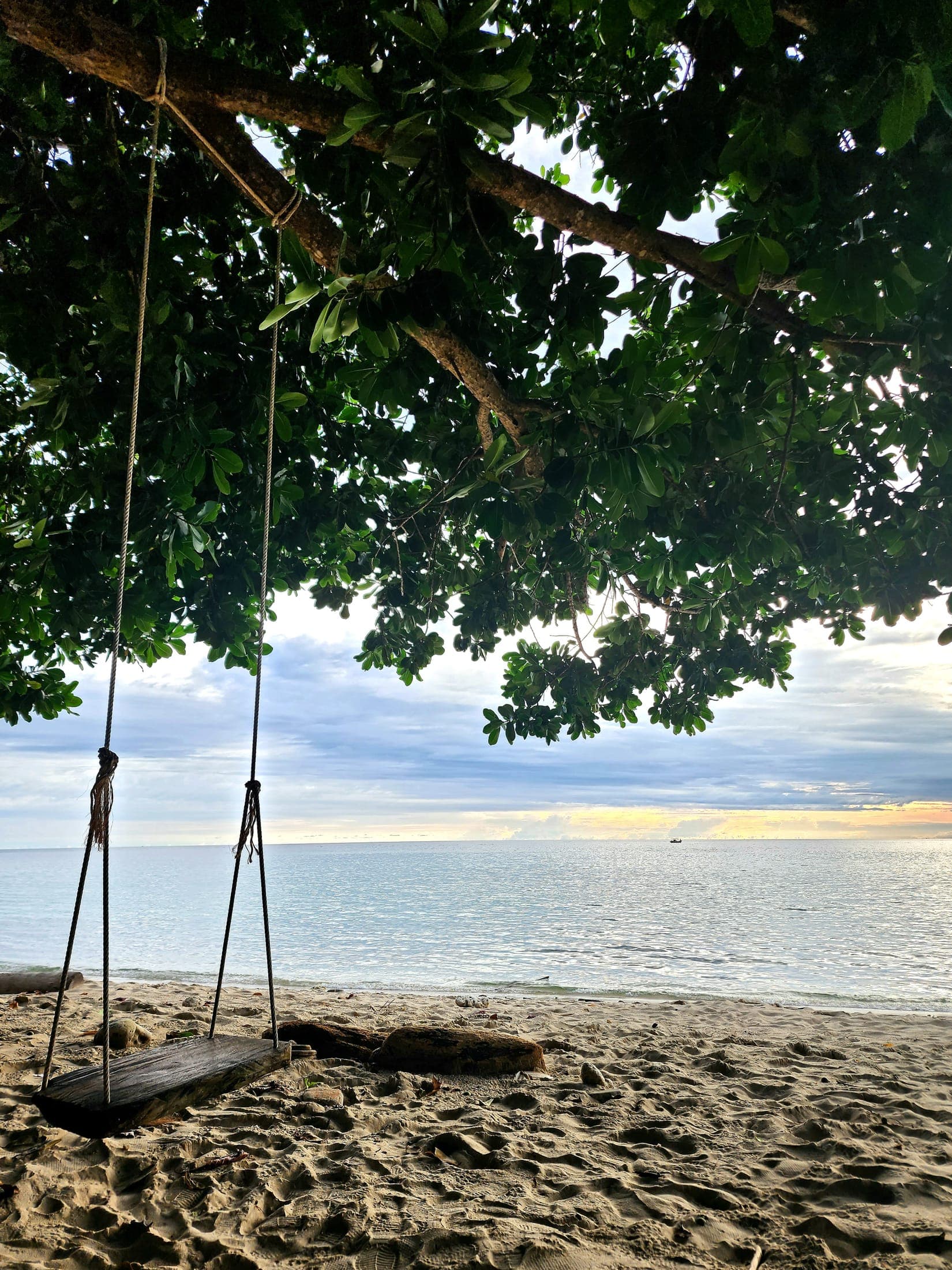 Swings on the sand at Lonely Beach at sunset, Koh Chang